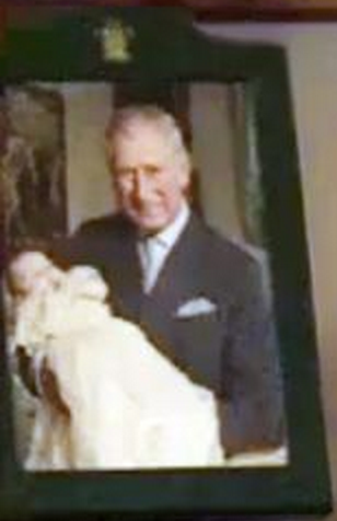 Prince Charles holding Prince George